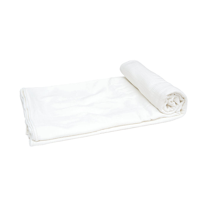 A Beacon Bed Throw displayed on a bed.