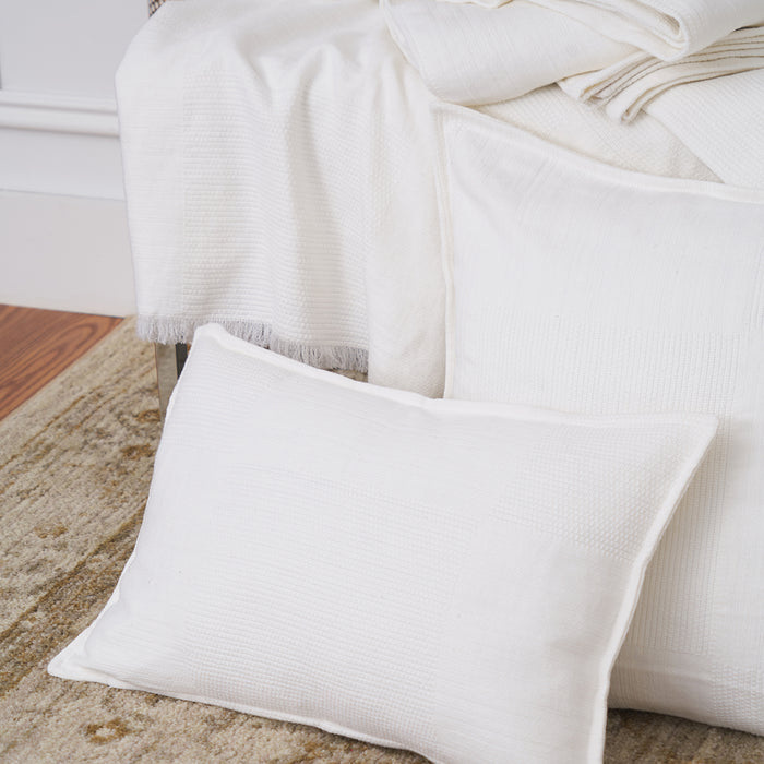 A Beacon Bed Throw displayed on a bed.