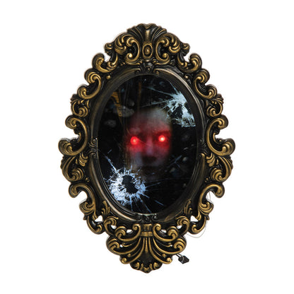 A Broken Mirror with Creepy Face.