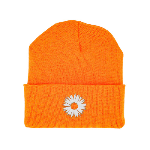 Orange beanie with a white flower design on a white background