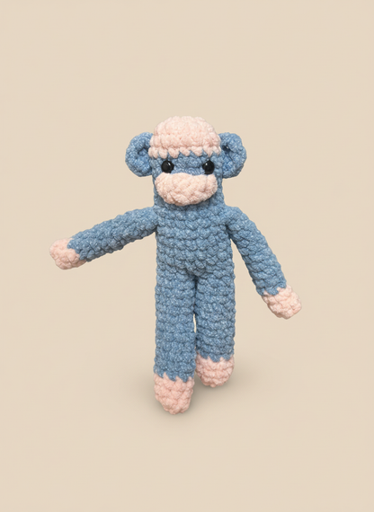 Sock monkey on clean beige background